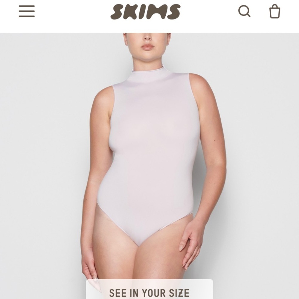ESSENTIAL MOCK NECK SLEEVELESS BODYSUIT